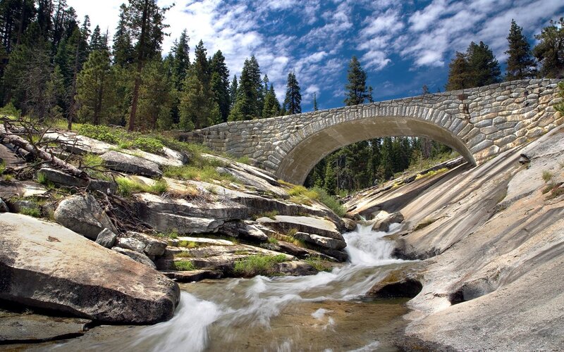 Stone Arch Bridge — Blue, Serene, Afternoon, Photograph, River, Trees