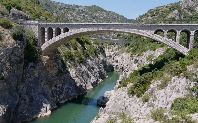 Stone Arch Bridge — Green, Serene, Afternoon, Photograph, River, Mountains, Road