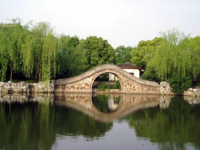 Stone Arch Bridge — Green, Serene, Afternoon