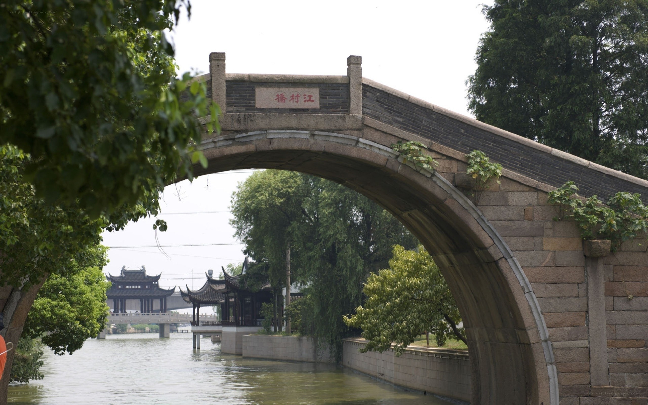 Stone arch bridge over canal