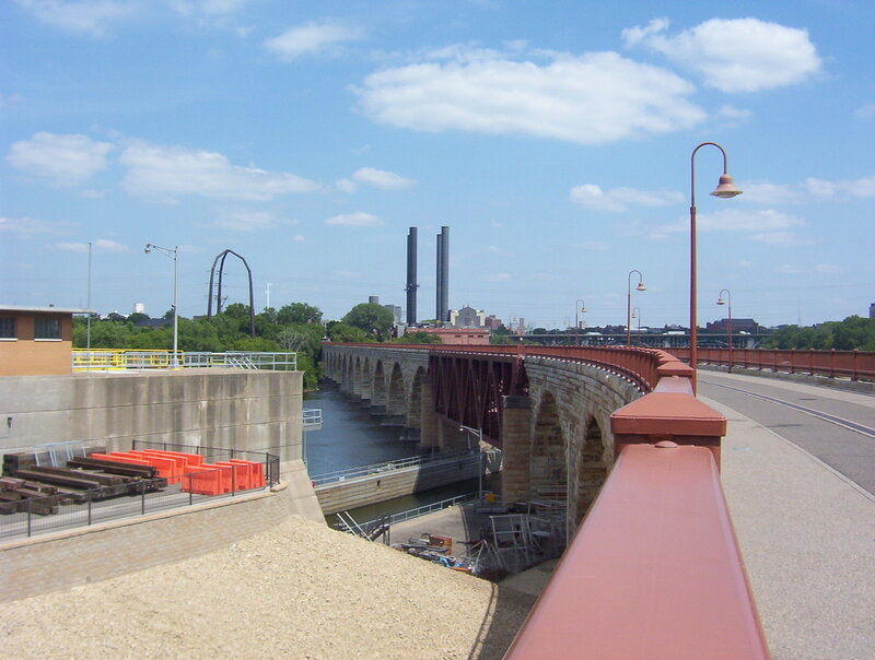Stone arch bridge over river
