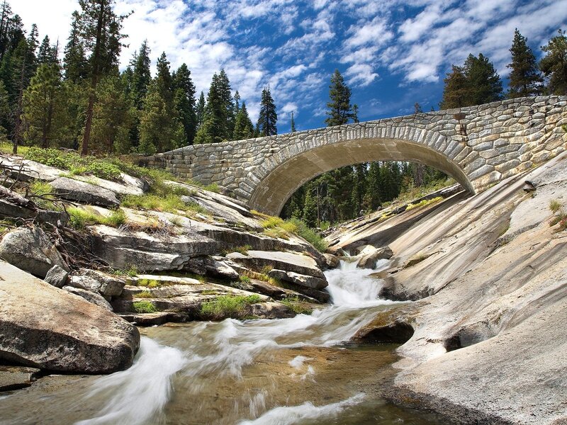 Stone Arch Bridge over Stream — Blue, Serene