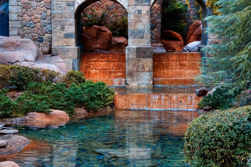 Stone arch waterfall garden