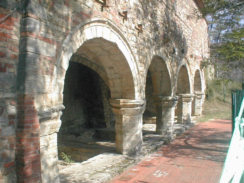 Stone arches of a historic wall