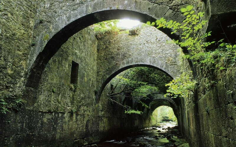 Stone arches over a river