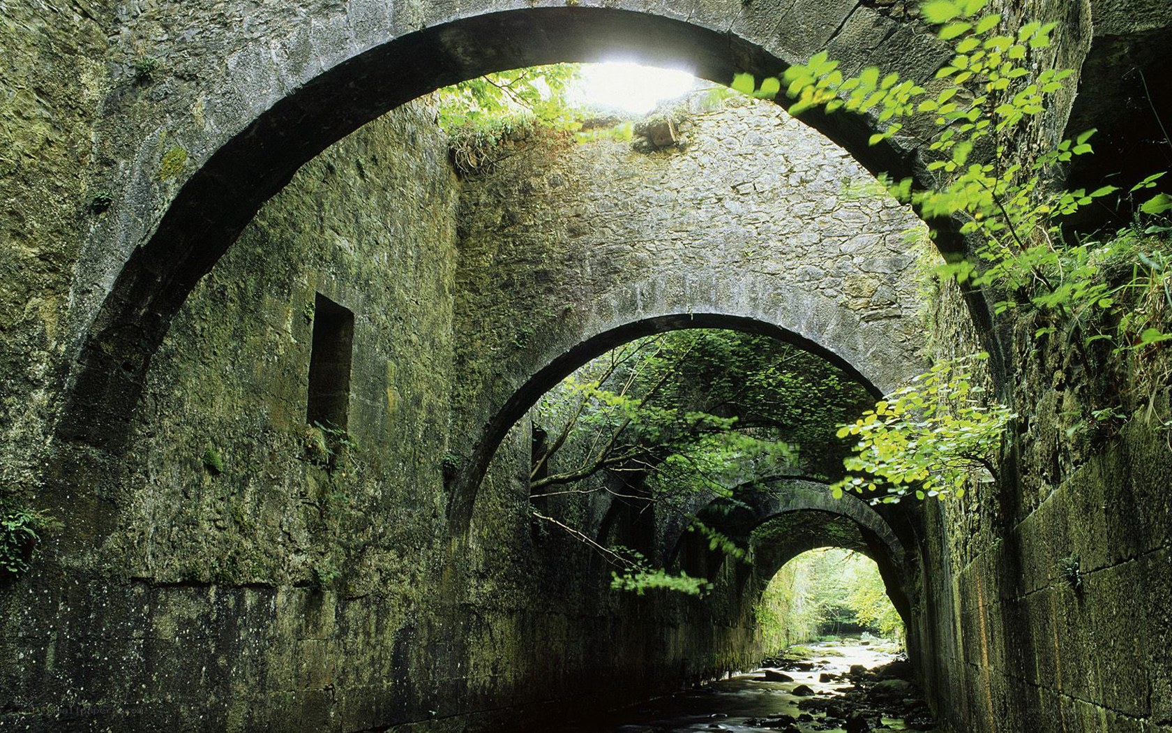 Stone arches over a river