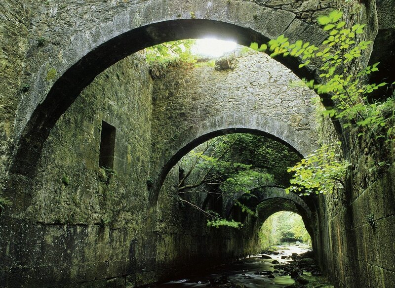 Stone arches over a stream