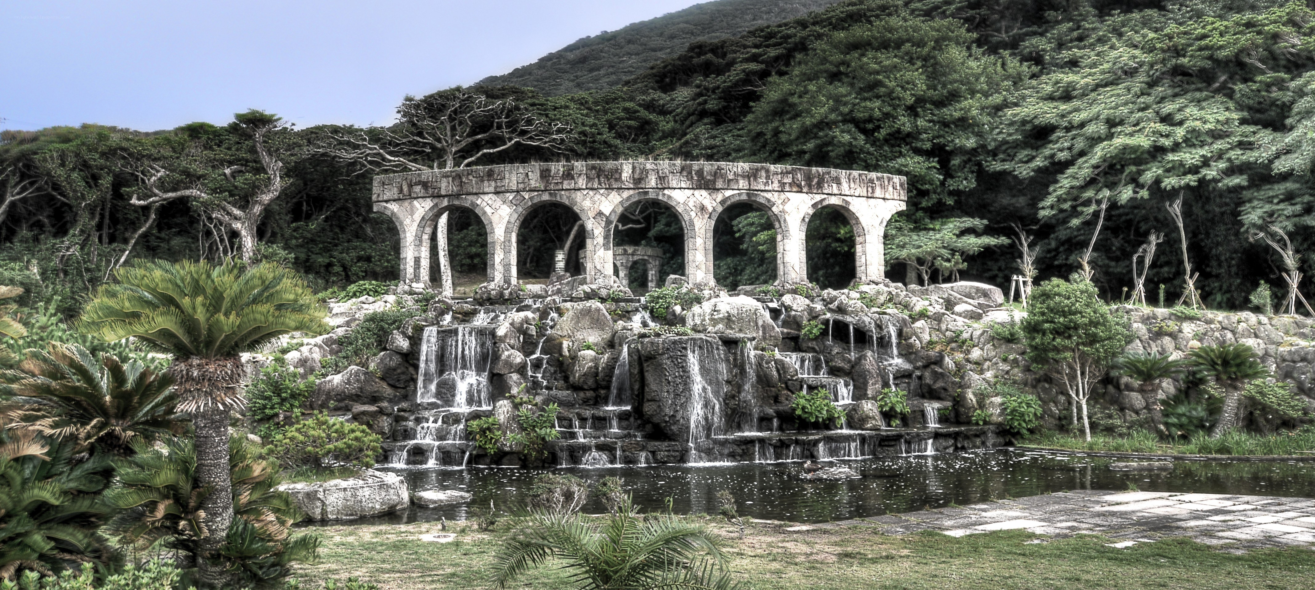 Stone arches with waterfall garden