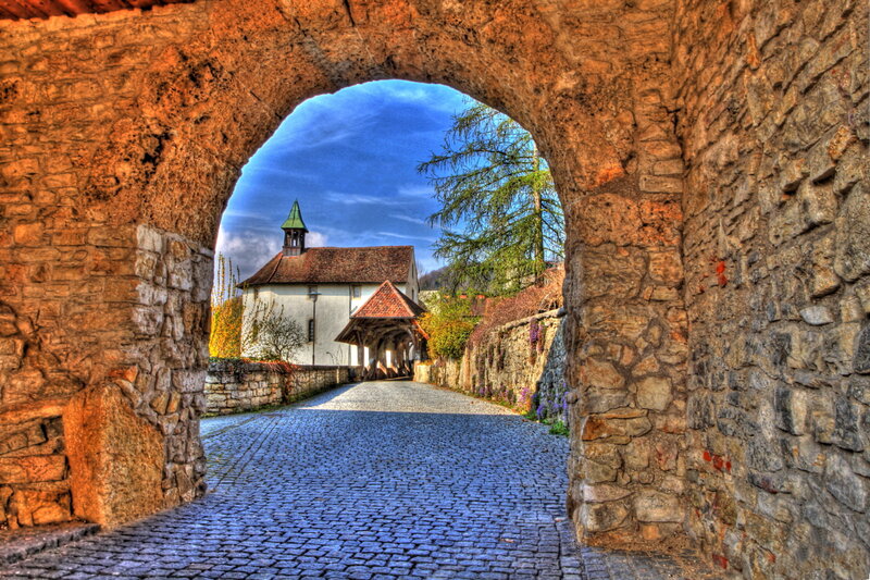 Stone Archway and Church