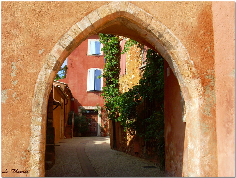 Stone archway in a narrow alley