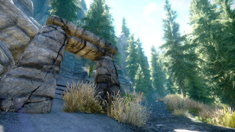 Stone archway in forest