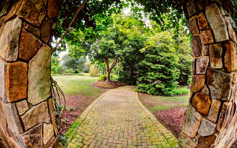 Stone Archway in Garden — Green, Serene, Afternoon, Photograph