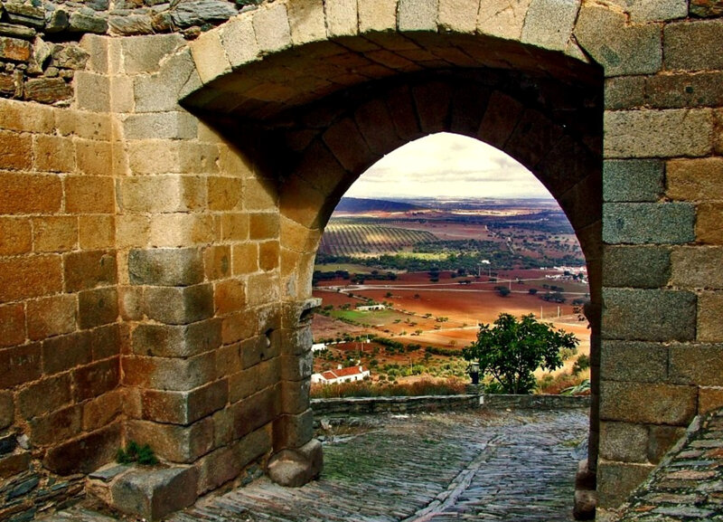 Stone archway view of countryside