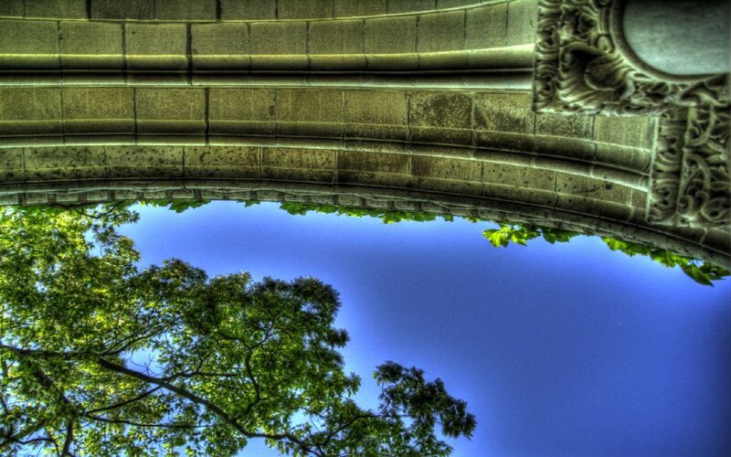 Stone archway with trees