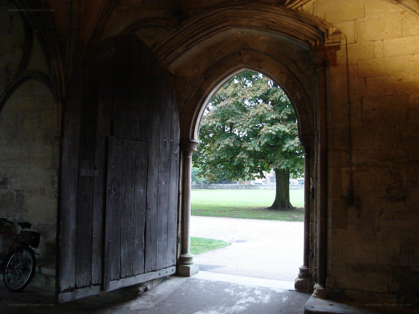 Stone archway with wooden door