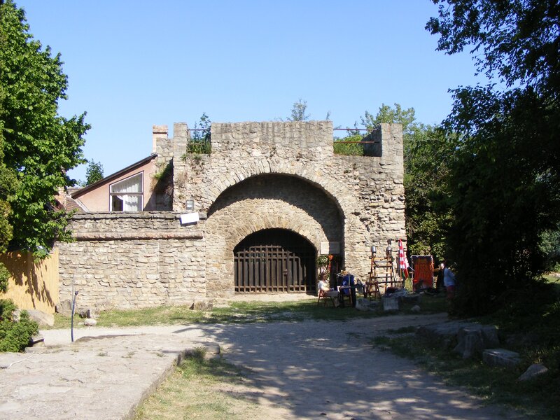 Stone archway with wooden gate