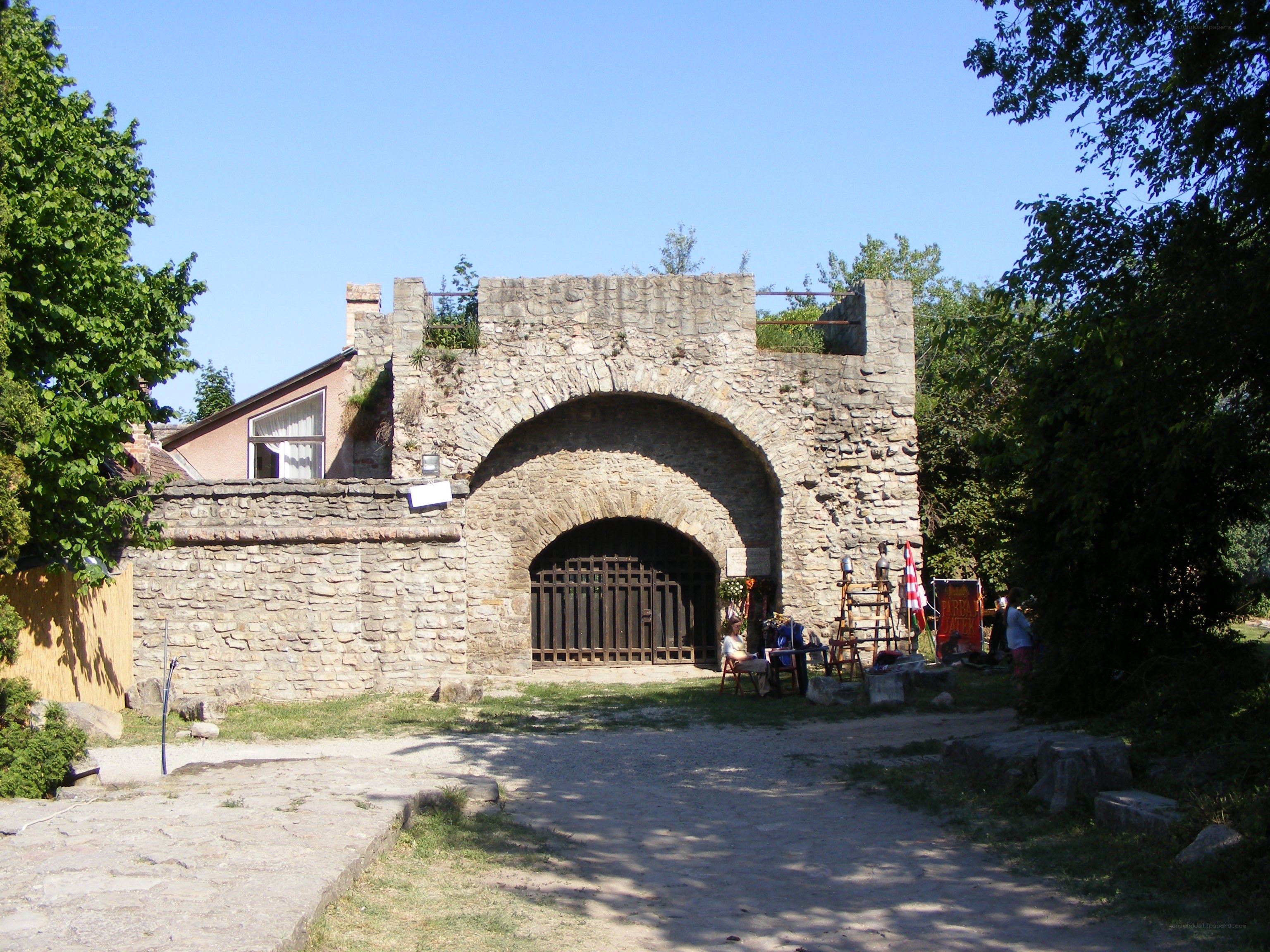 Stone archway with wooden gate