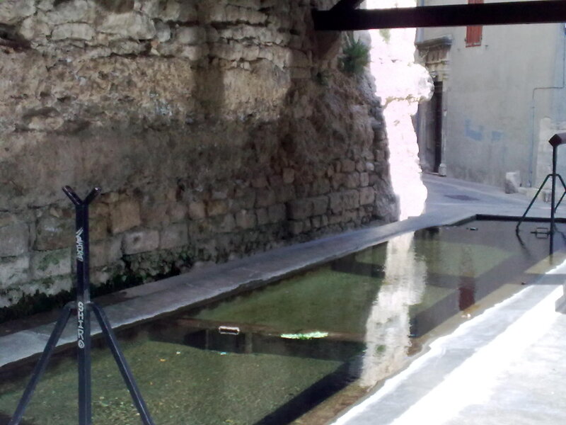 stone basin in alleyway
