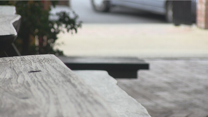 stone bench in outdoor setting