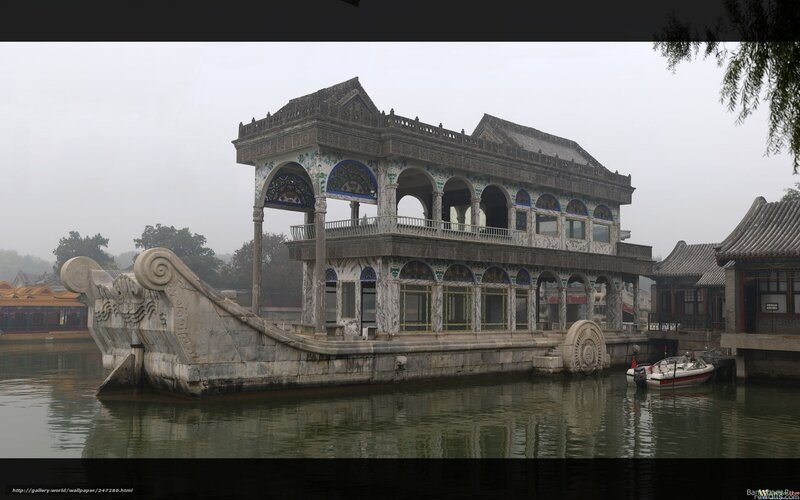 Stone boat pavilion in a misty garden