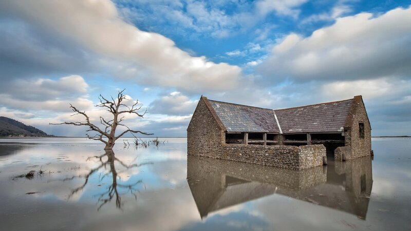 Stone Boathouse in Water