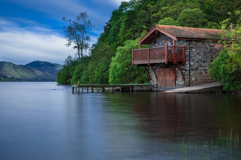 Stone Boathouse on Lake — Blue, Serene, Afternoon