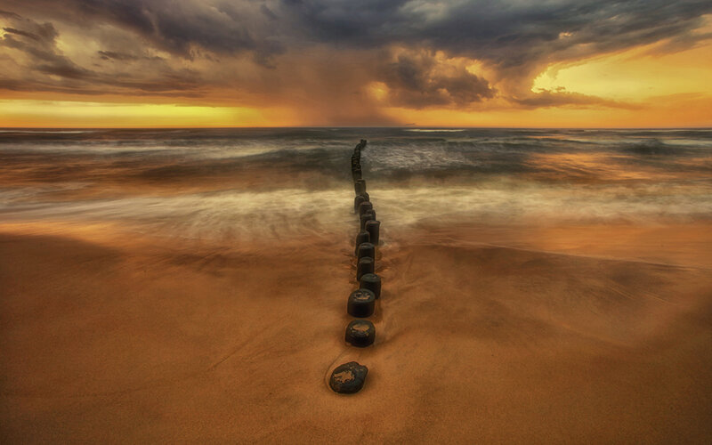 Stone Breakwater on Beach
