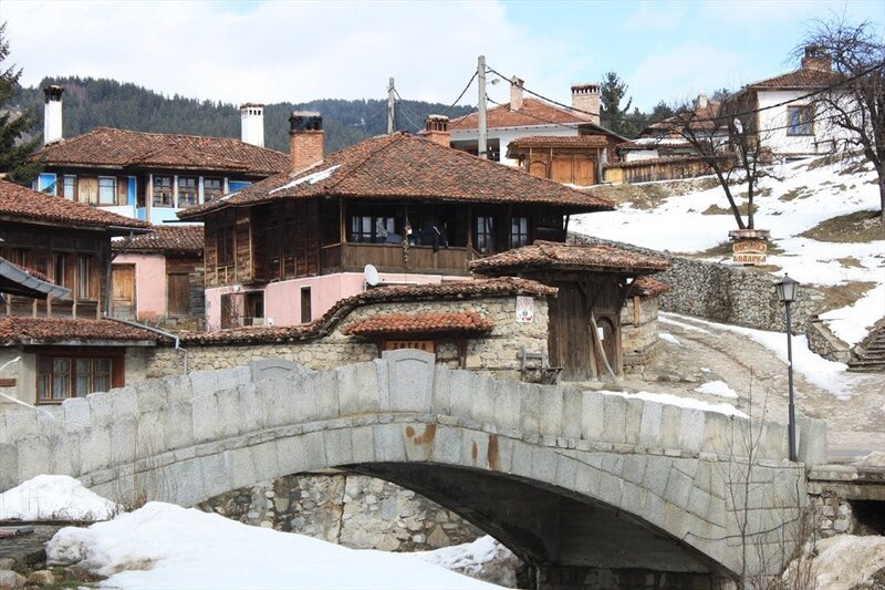 Stone bridge in a snowy village