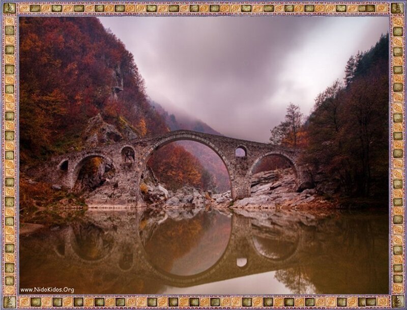 Stone bridge in autumn valley