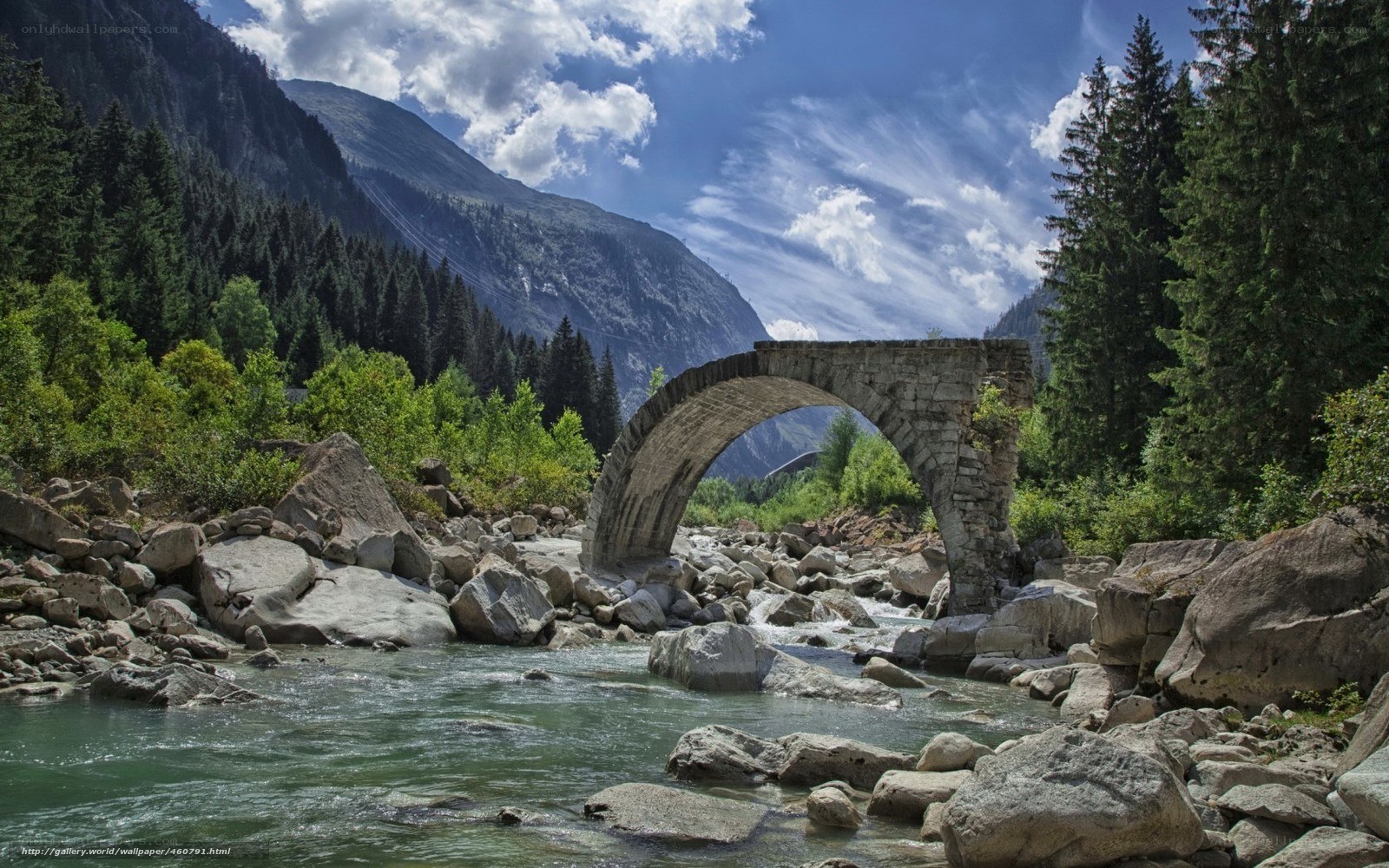 Stone bridge in mountain valley