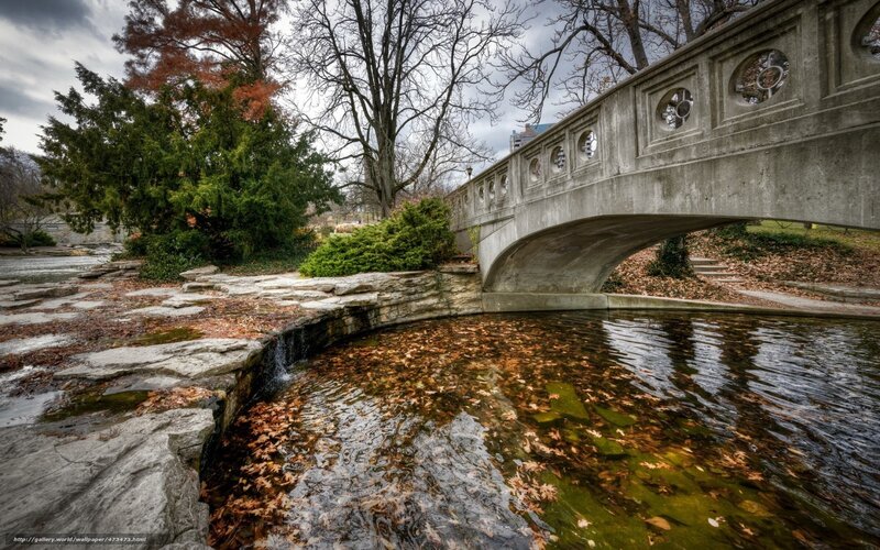Stone bridge over autumn stream
