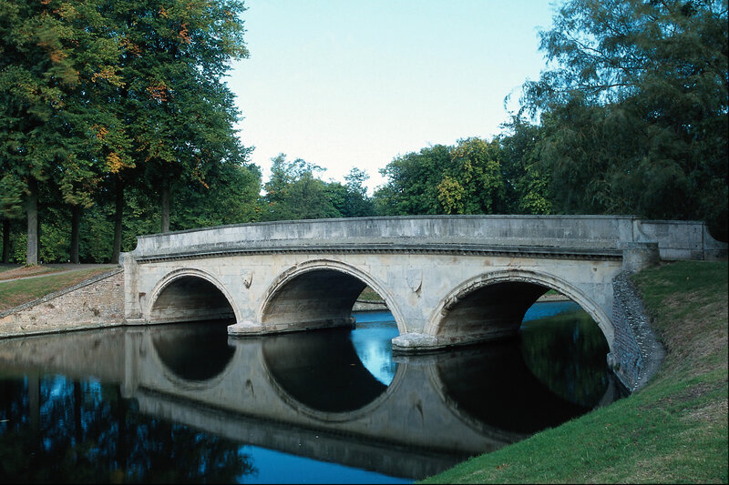 Stone Bridge over Canal — Green, Serene, Afternoon, Photograph, Trees, Arches