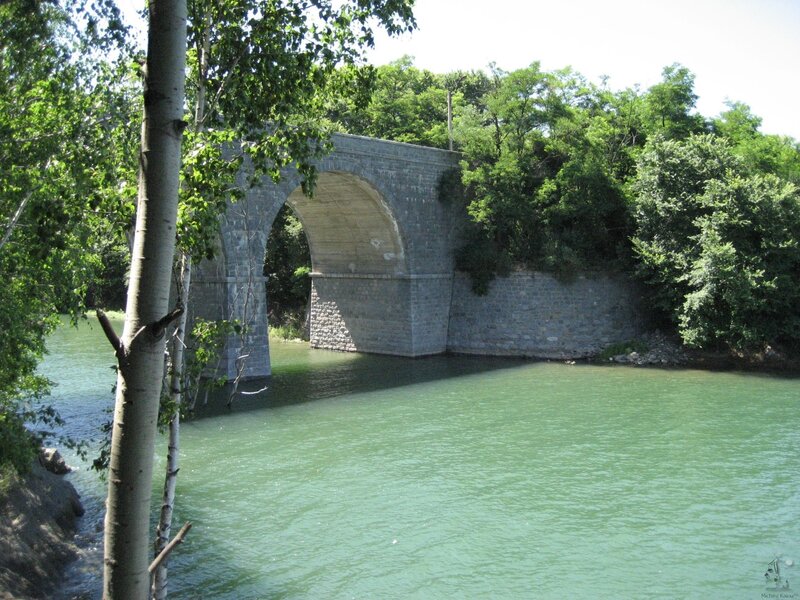 Stone bridge over river