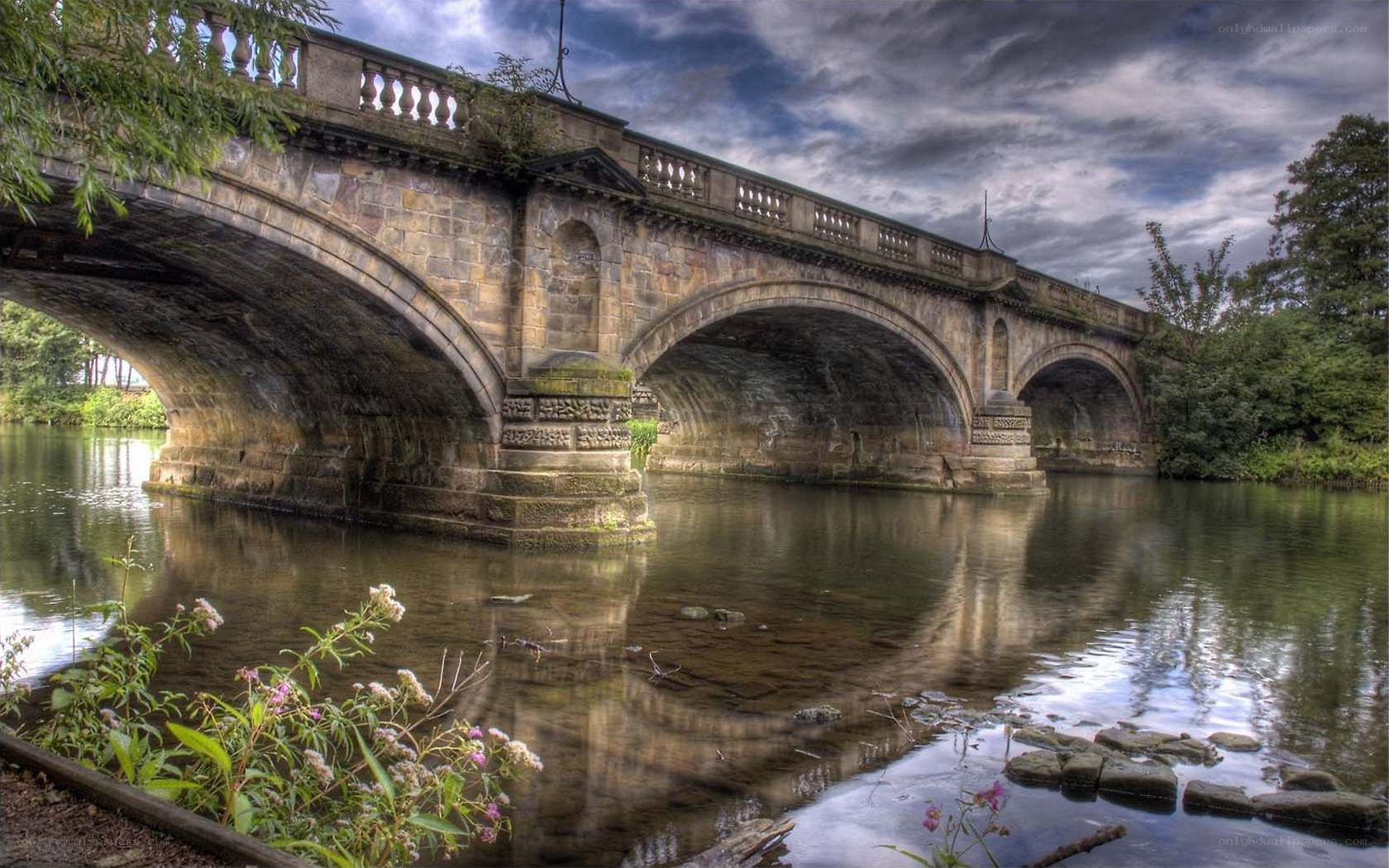 Stone bridge over river