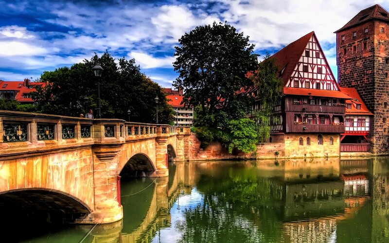 Stone Bridge over River — Blue, Dramatic, Afternoon, Photograph, Buildings