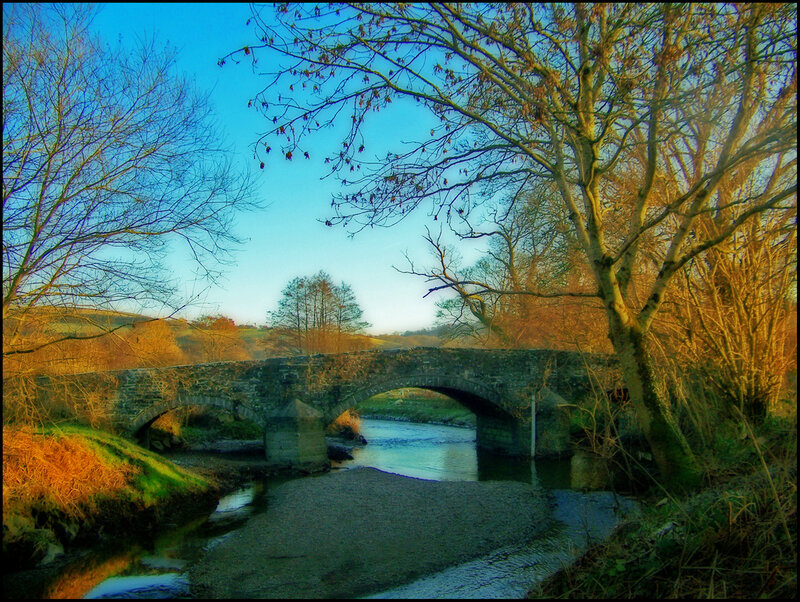 Stone Bridge over River — Blue, Serene, Autumn, Photograph, Trees