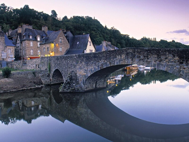 Stone Bridge over River — Blue, Serene, Sunset, Photograph, Buildings