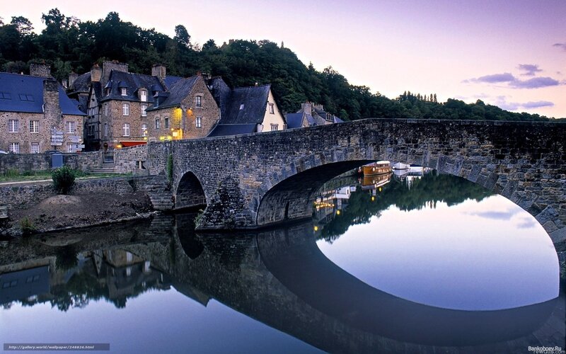 Stone Bridge over River — Blue, Serene, Sunset, Photograph, Buildings, Trees, Boats