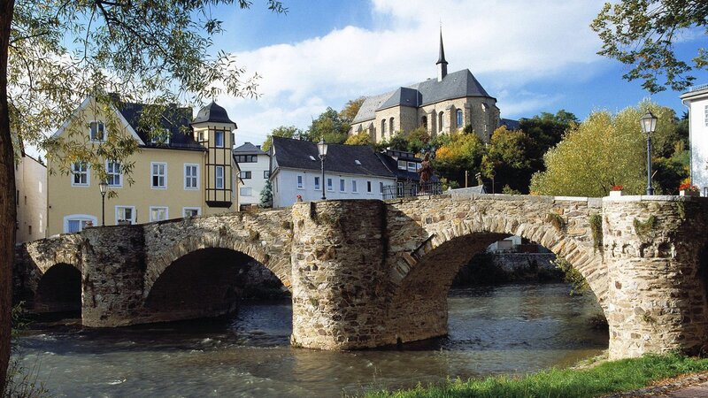Stone Bridge over River — Brown, Serene, Autumn, Photograph, Church