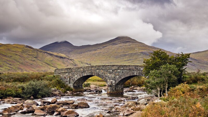 Stone Bridge over River — Green, Dramatic, Afternoon, Photograph, Mountains
