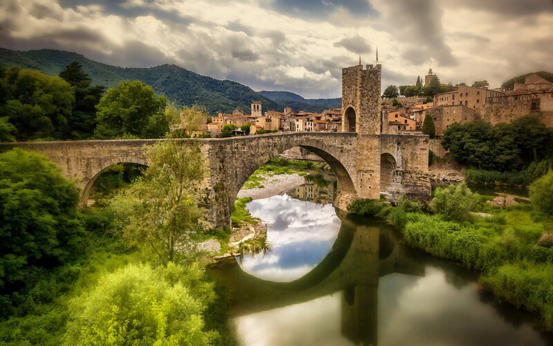 Stone Bridge over River — Green, Dramatic, Afternoon, Photograph, Town