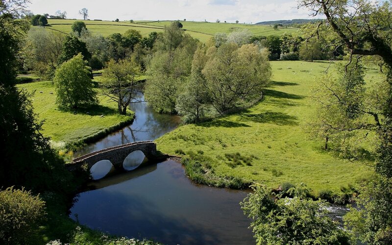 Stone Bridge over River — Green, Serene, Afternoon, Photograph, Fields