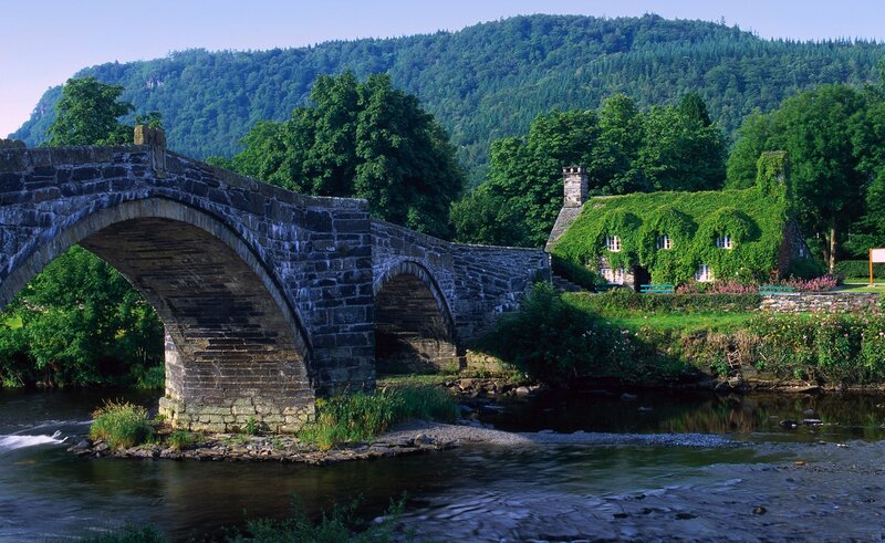 Stone Bridge over River — Green, Serene, Afternoon, Photograph, House, Mountain