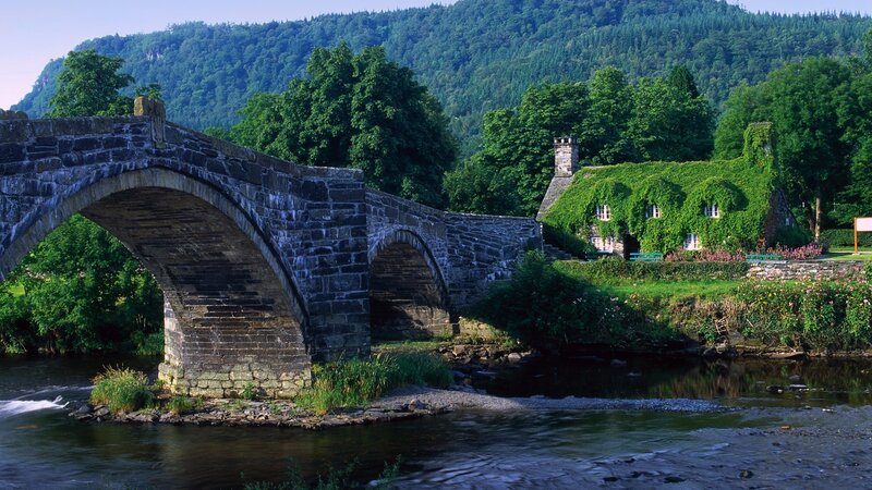 Stone Bridge over River — Green, Serene, Afternoon, Photograph, House