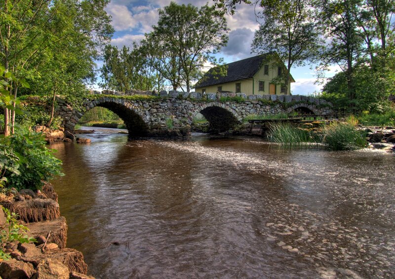 Stone Bridge over River — Green, Serene, Afternoon, Photograph, House, Trees, Brown, Blue