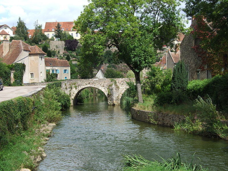 Stone Bridge over River — Green, Serene, Afternoon, Photograph, Trees, Buildings, Brown