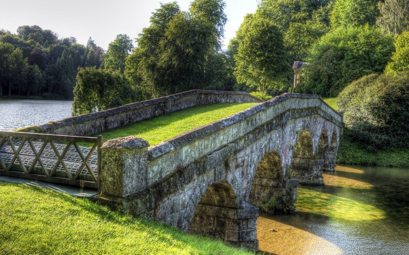 Stone Bridge over River — Green, Serene, Afternoon, Photograph, Trees, Grass, Brown, Blue