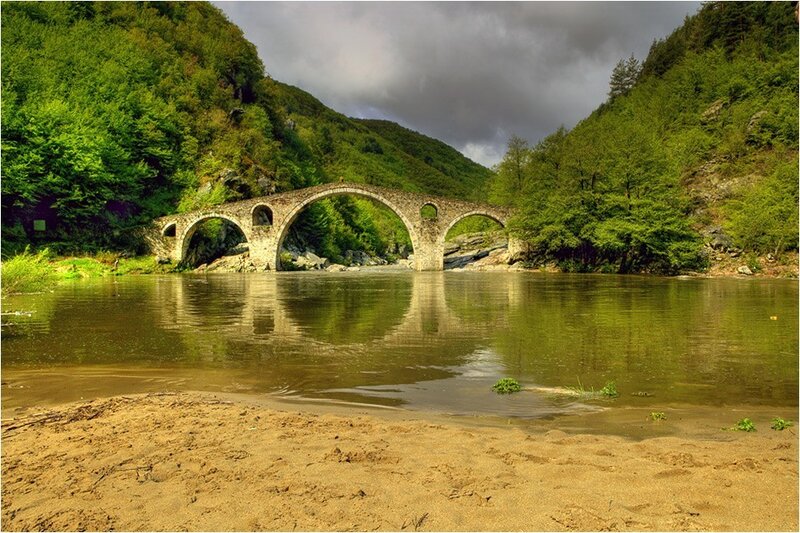 Stone Bridge over River — Green, Serene, Afternoon, Photograph, Trees, Hills, Brown