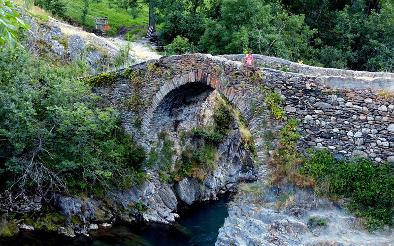 Stone Bridge over River — Green, Serene, Afternoon, Photograph, Trees, Person