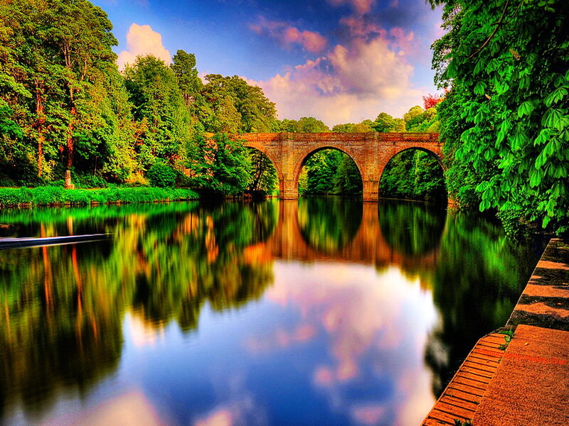 Stone Bridge over River — Green, Serene, Afternoon, Photograph, Trees, Sky, Path